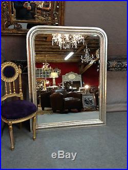 Miroir de style Louis Philippe en bois argenté 138 x 110 cm